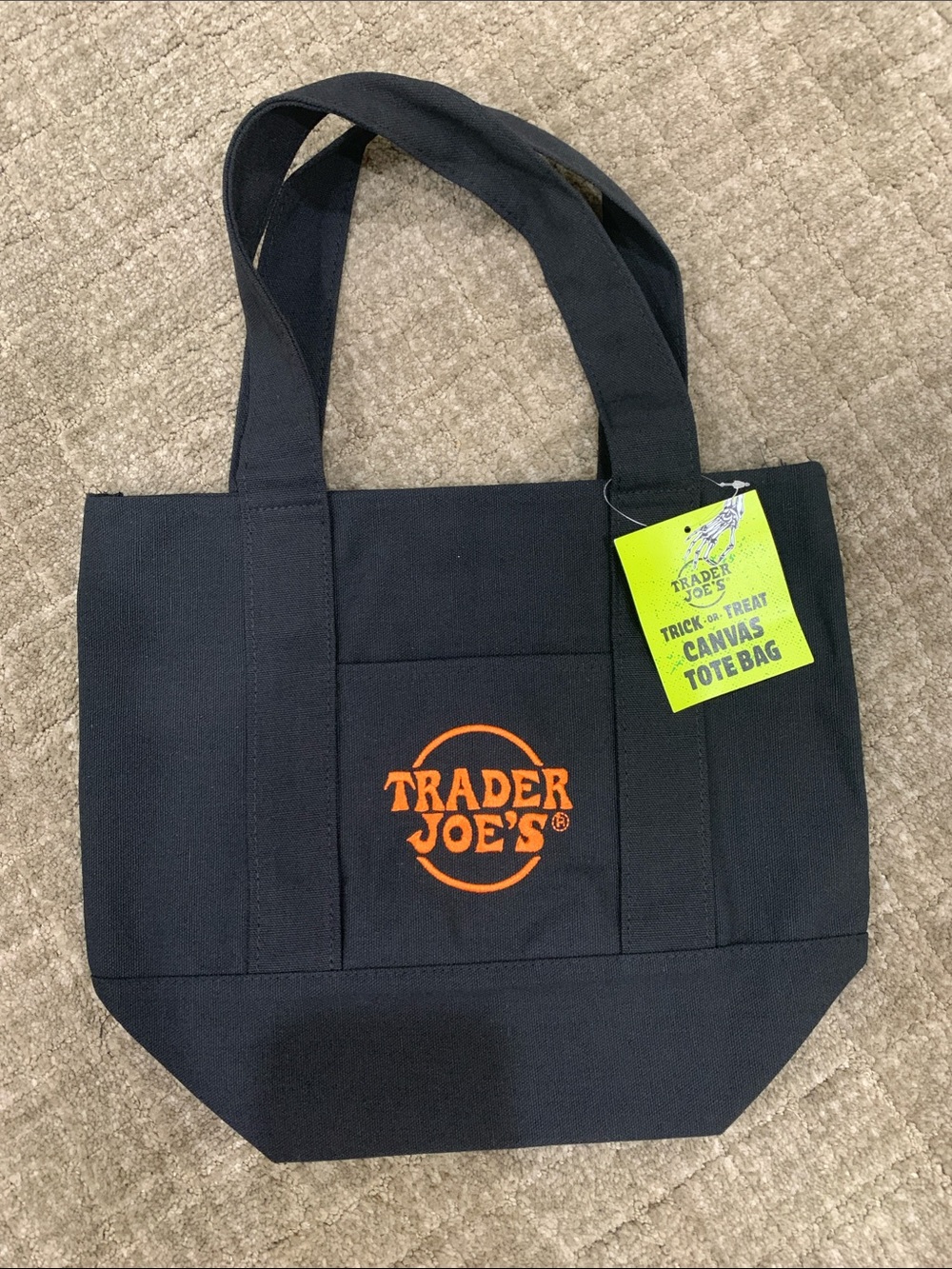 Trader Joe’s black canvas mini tote with pockets.